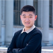 A headshot photo of Junle Xu