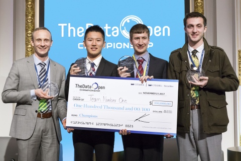 Photo of students receiving big check
